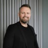 En profilbild av fastighetsmäklare Julius Lindberg