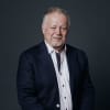 En profilbild av fastighetsmäklare Lars-Erik Eriksson