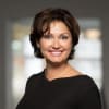 En profilbild av fastighetsmäklare Liliya Morozova