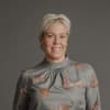 En profilbild av fastighetsmäklare Linda Grundström