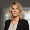 En profilbild av fastighetsmäklare Malin Nilsson