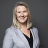 En profilbild av fastighetsmäklare Marika Ström