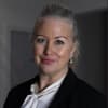 En profilbild av fastighetsmäklare Sandra Nothin