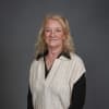 En profilbild av fastighetsmäklare Yvonne Eklund