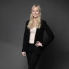 En profilbild av fastighetsmäklare Louise Sundberg