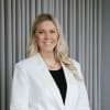 En profilbild av fastighetsmäklare Kajsa Bergklint