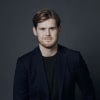 En profilbild av fastighetsmäklare Henning Wennberg
