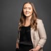 En profilbild av fastighetsmäklare Daniella Ahlström