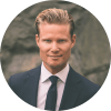 En profilbild av fastighetsmäklare Christian Lundin