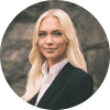 En profilbild av fastighetsmäklare Patricia Warnlöf
