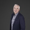 En profilbild av fastighetsmäklare Johan Agnesund