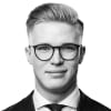 En profilbild av fastighetsmäklare Anton Borbos