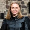 En profilbild av fastighetsmäklare Isabelle Öberg