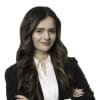 En profilbild av fastighetsmäklare Aleksandra Teros
