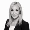 En profilbild av fastighetsmäklare Marie Engström