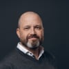 En profilbild av fastighetsmäklare Jarmo Aimoson