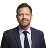 En profilbild av fastighetsmäklare Martin Qvarfordt