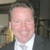 En profilbild av fastighetsmäklare Patrik Edgren
