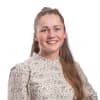 En profilbild av fastighetsmäklare Caroline Perdegård