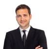 En profilbild av fastighetsmäklare Eddy Lloret