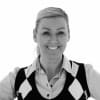 En profilbild av fastighetsmäklare Karin Andersson