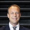 En profilbild av fastighetsmäklare Daniel Söderström