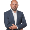 En profilbild av fastighetsmäklare Håkan Lindén