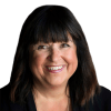 En profilbild av fastighetsmäklare Gunilla Eriksson