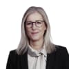 En profilbild av fastighetsmäklare Camilla Lundblad