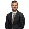 En profilbild av fastighetsmäklare Richard Sedman