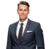 En profilbild av fastighetsmäklare Robin Rydén