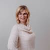 En profilbild av fastighetsmäklare Hanna Sars