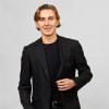 En profilbild av fastighetsmäklare Felix Thunholm