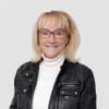 En profilbild av fastighetsmäklare Ann Sjöberg
