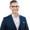 En profilbild av fastighetsmäklare Alexander Bergh
