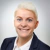En profilbild av fastighetsmäklare Sara Wiberg
