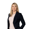 En profilbild av fastighetsmäklare Patricia Lüdke