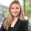 En profilbild av fastighetsmäklare Hanne Söderström