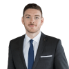 En profilbild av fastighetsmäklare Andreas Hansson