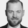 En profilbild av fastighetsmäklare Anders Olsson
