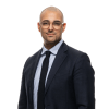 En profilbild av fastighetsmäklare Victor Aghester