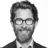 En profilbild av fastighetsmäklare Svante Sonesson