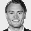 En profilbild av fastighetsmäklare Douglas Davidsson