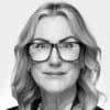 En profilbild av fastighetsmäklare Carina Odelstad