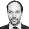 En profilbild av fastighetsmäklare Martin Sundelin