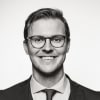En profilbild av fastighetsmäklare Jacob Iwarsson