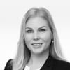 En profilbild av fastighetsmäklare Marie Östling
