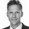 En profilbild av fastighetsmäklare Mattias Östberg