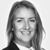 En profilbild av fastighetsmäklare Charlotte Hallberg