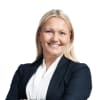 En profilbild av fastighetsmäklare Eva Samuelsson